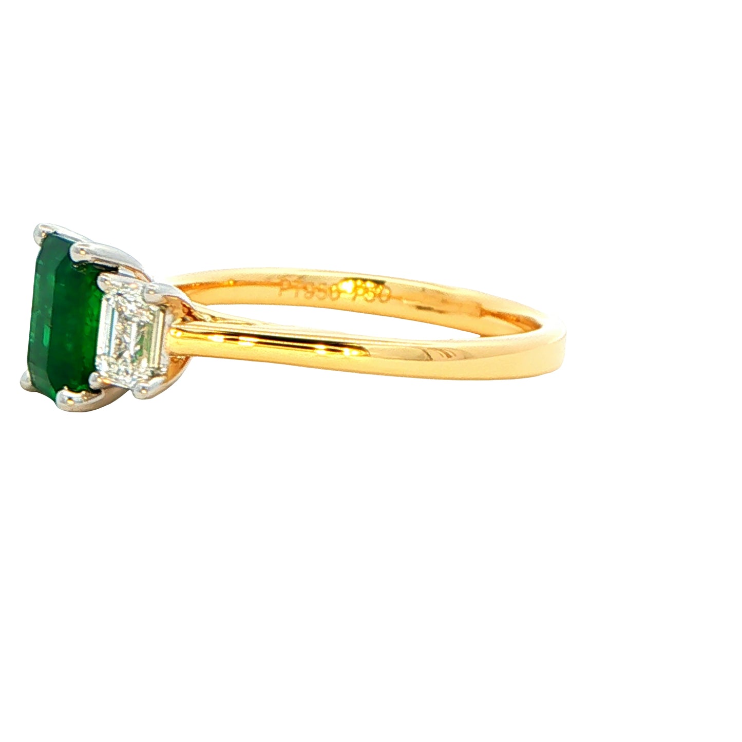 Octagonal shaped emerald and emerald cut diamond 3 stone ring Gardiner Brothers