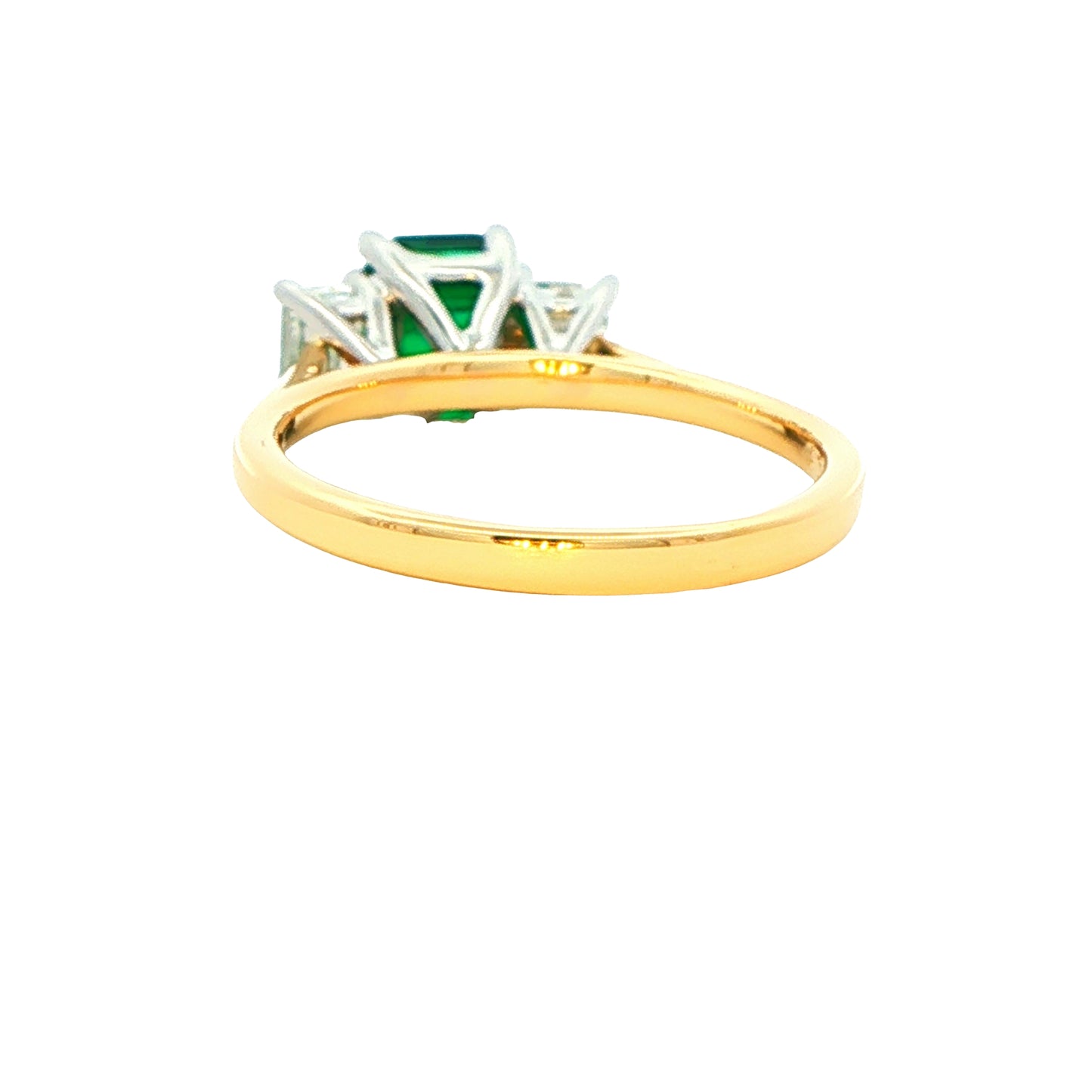 Octagonal shaped emerald and emerald cut diamond 3 stone ring Gardiner Brothers