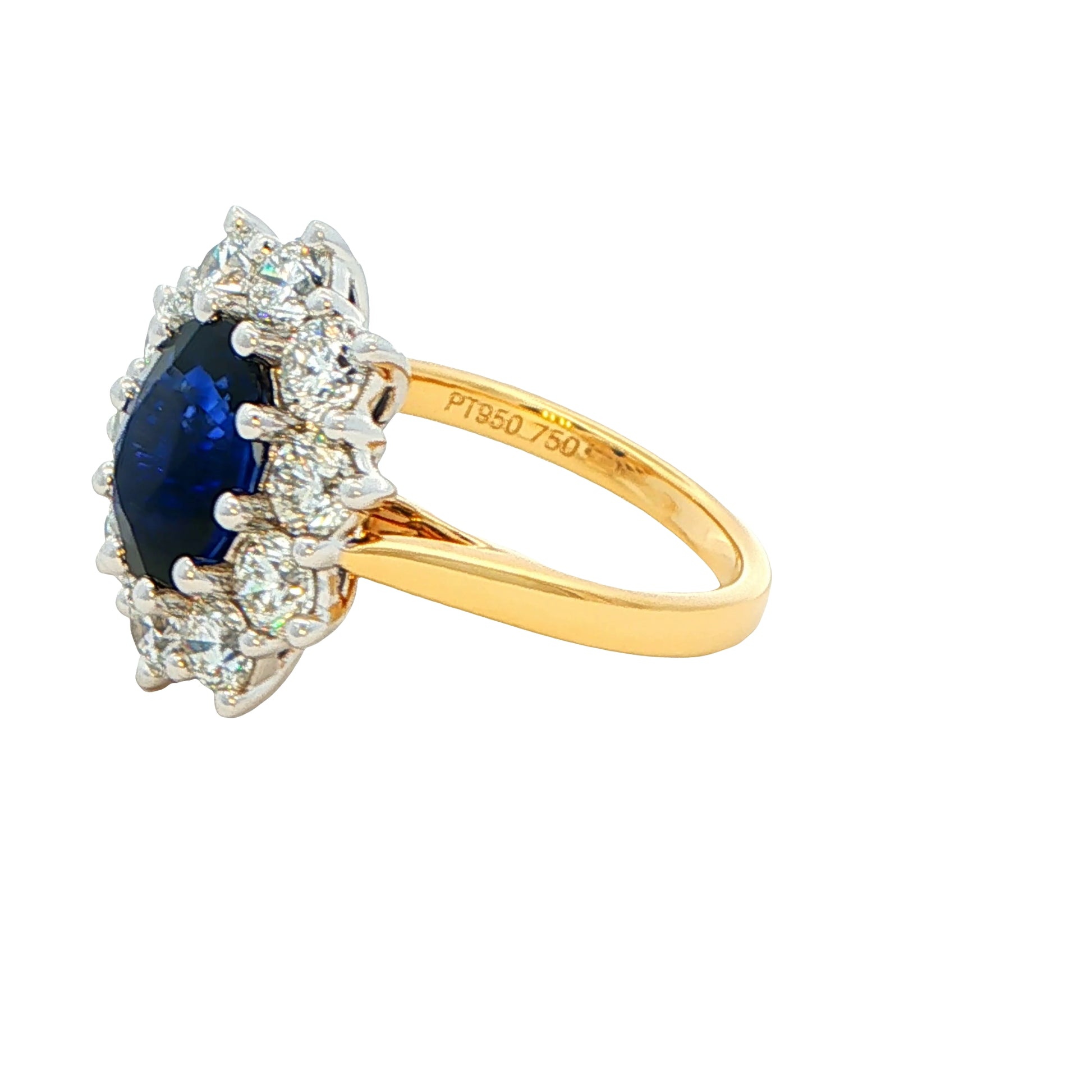 Oval shaped Sapphire and 10 round brilliant cut diamond cluster style ring Gardiner Brothers
