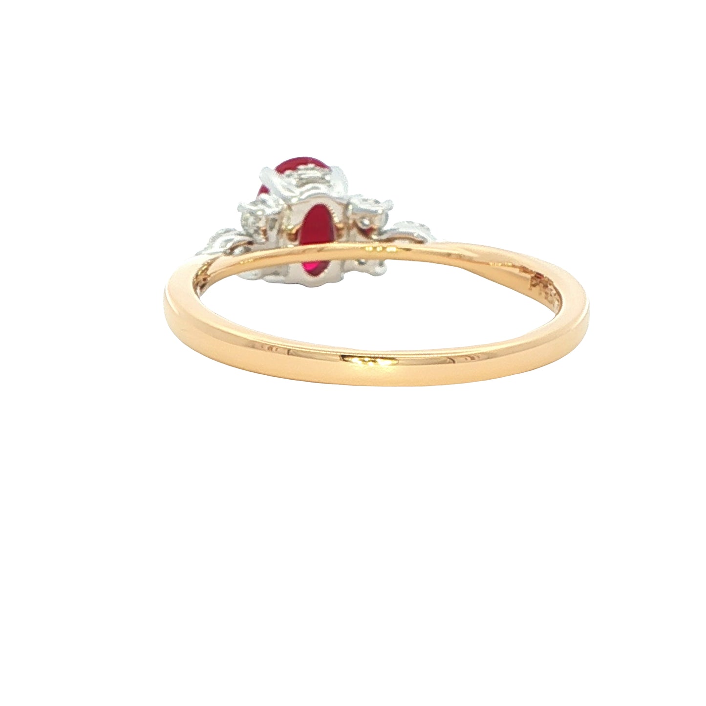 Oval shaped ruby with brilliant and marquise shaped diamond shoulders Gardiner Brothers