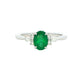 Oval shaped emerald with brilliant and marquise shaped diamond shoulders Gardiner Brothers