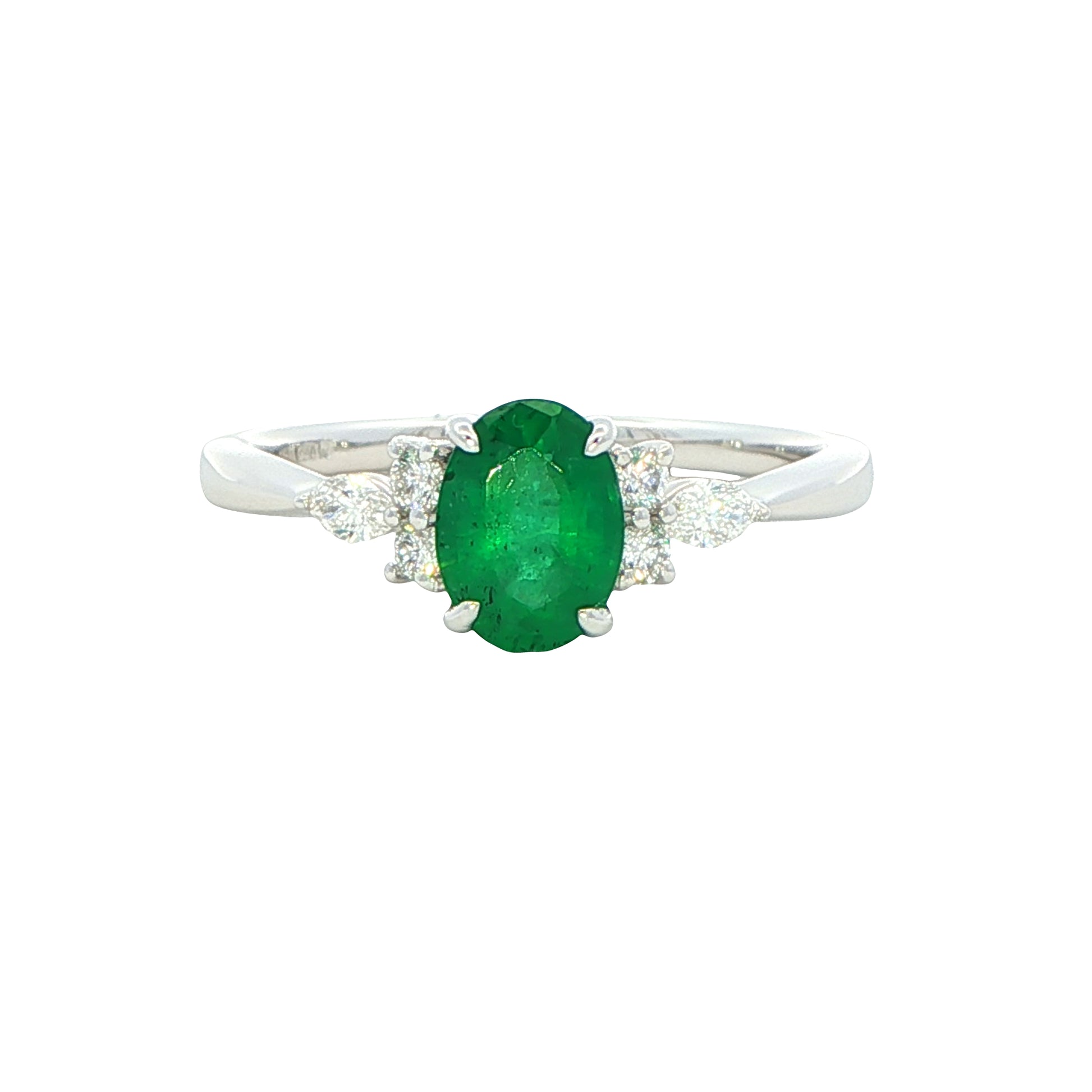 Oval shaped emerald with brilliant and marquise shaped diamond shoulders Gardiner Brothers