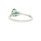 Oval shaped emerald with brilliant and marquise shaped diamond shoulders Gardiner Brothers