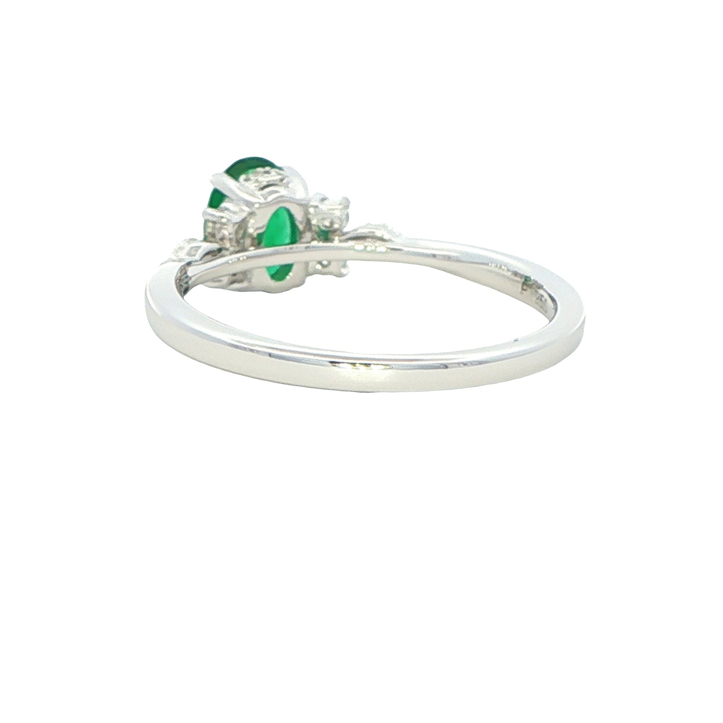 Oval shaped emerald with brilliant and marquise shaped diamond shoulders Gardiner Brothers