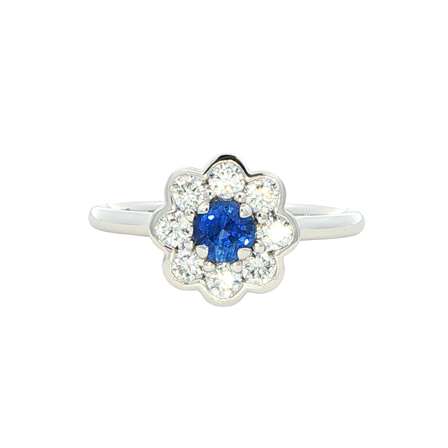 Round sapphire and round brilliant cut diamond cluster style ring Gardiner Brothers