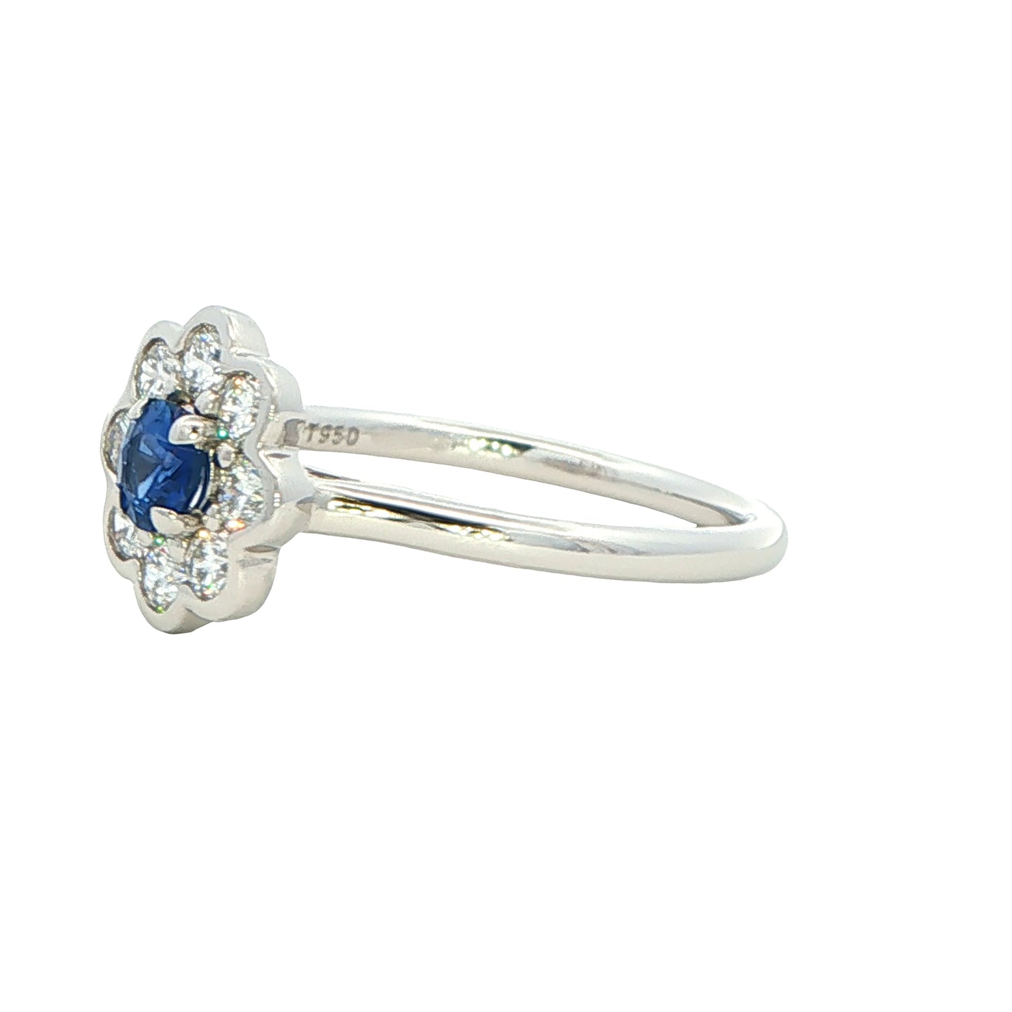 Round sapphire and round brilliant cut diamond cluster style ring Gardiner Brothers