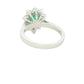 Pear Shaped emerald and round brilliant cut diamond cluster ring