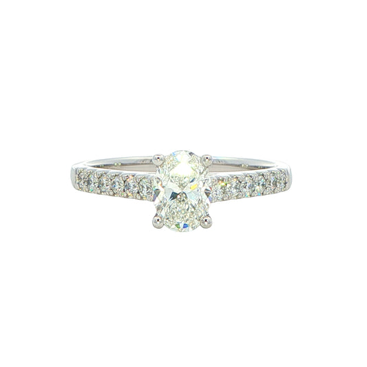 Oval shaped diamond solitaire with round brilliant cut diamond set shoulders - 0.95cts