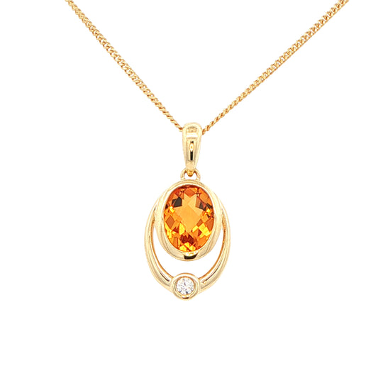 Oval Citrine and round brilliant cut diamond pendant