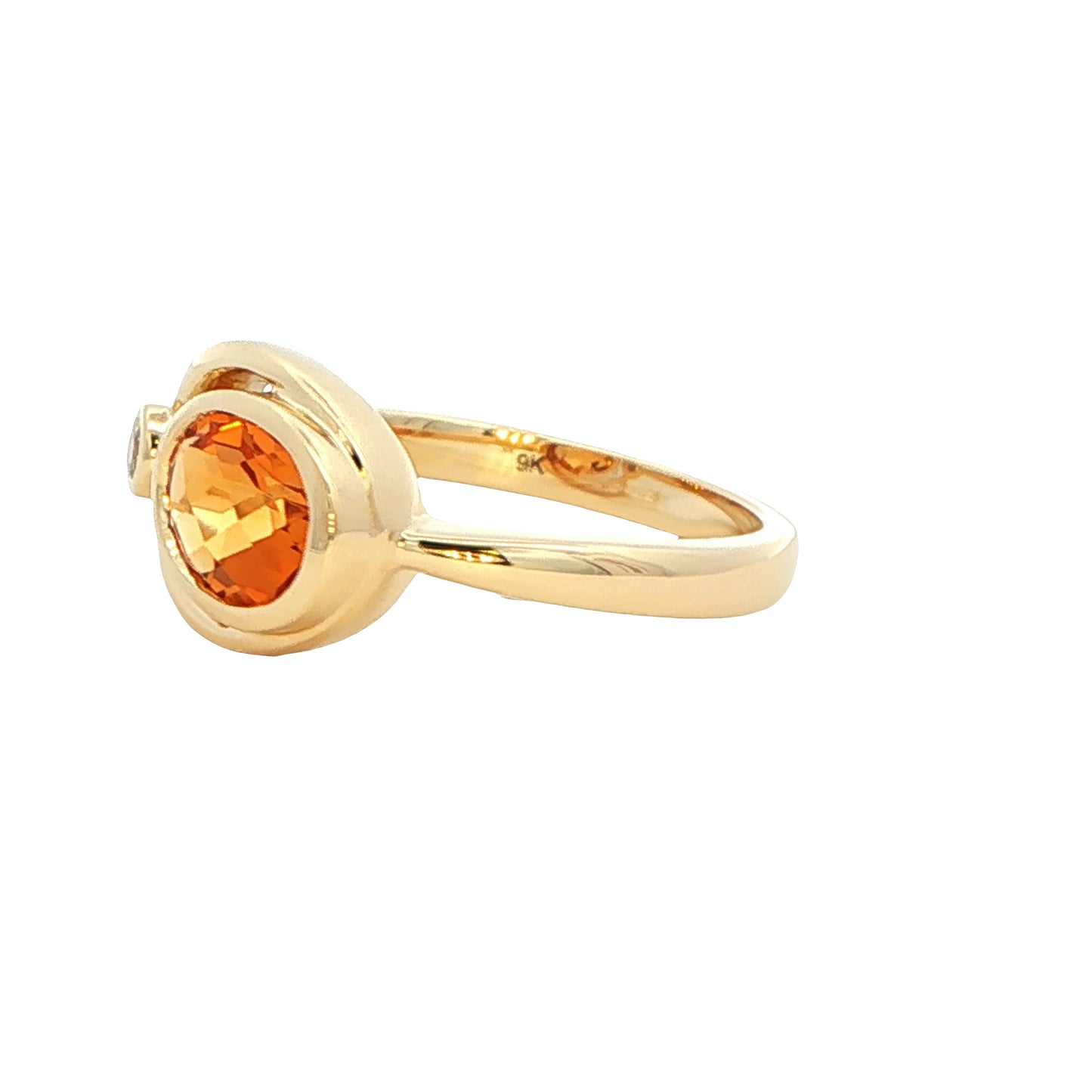 Oval shaped Citrine and round brilliant cut diamond dress ring Gardiner Brothers