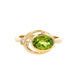 Oval shaped Peridot and round brilliant cut diamond dress ring Gardiner Brothers