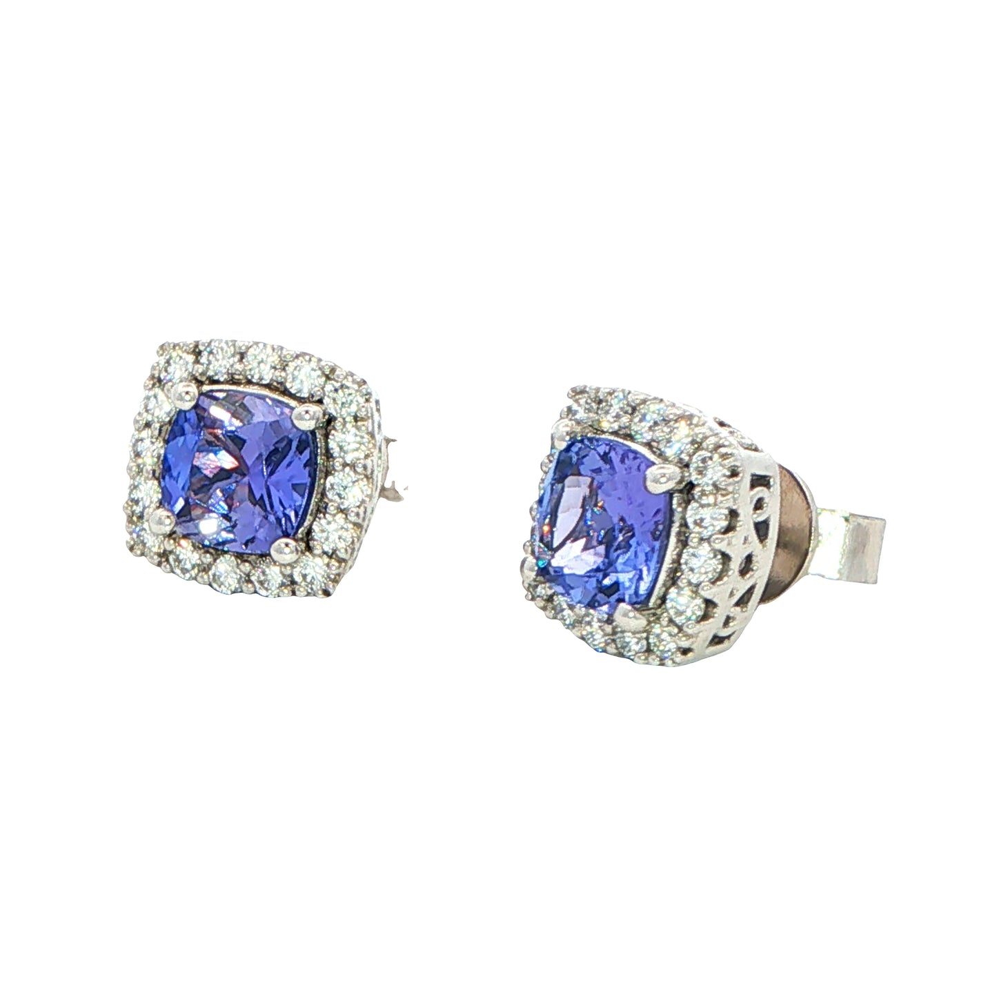 Cushion Shaped Tanzanite and round brilliant cut diamond halo earrings Gardiner Brothers