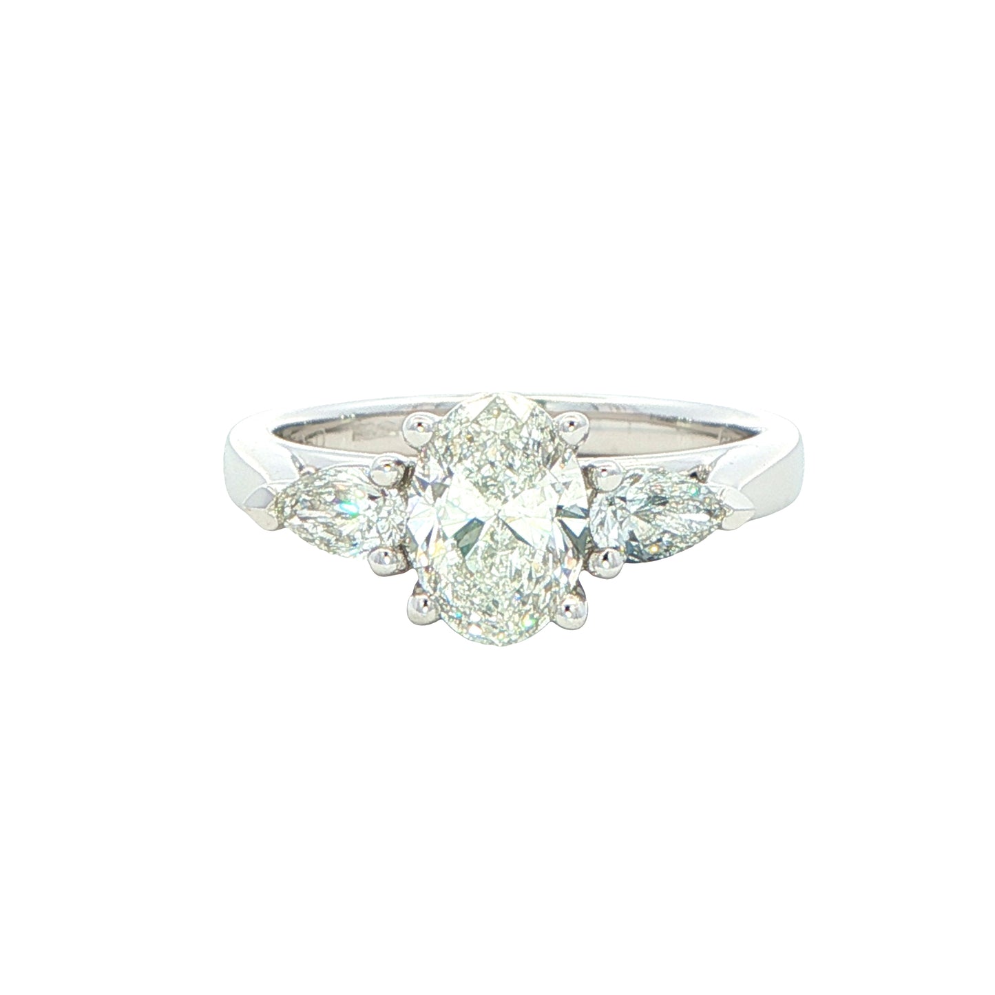Oval and pear shaped diamond 3 stone ring - 1.30cts
