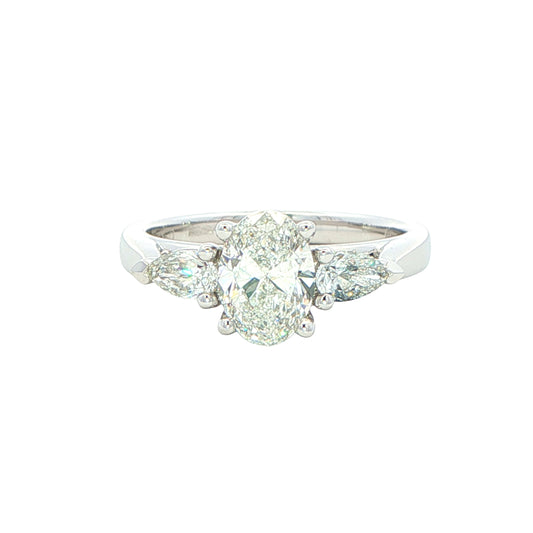 Oval and pear shaped diamond 3 stone ring - 1.30cts