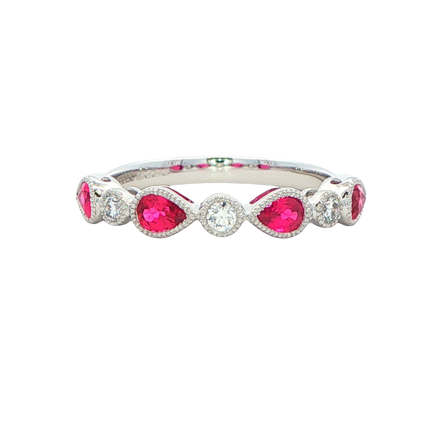 Pear Shaped Ruby and round brilliant cut diamond ring