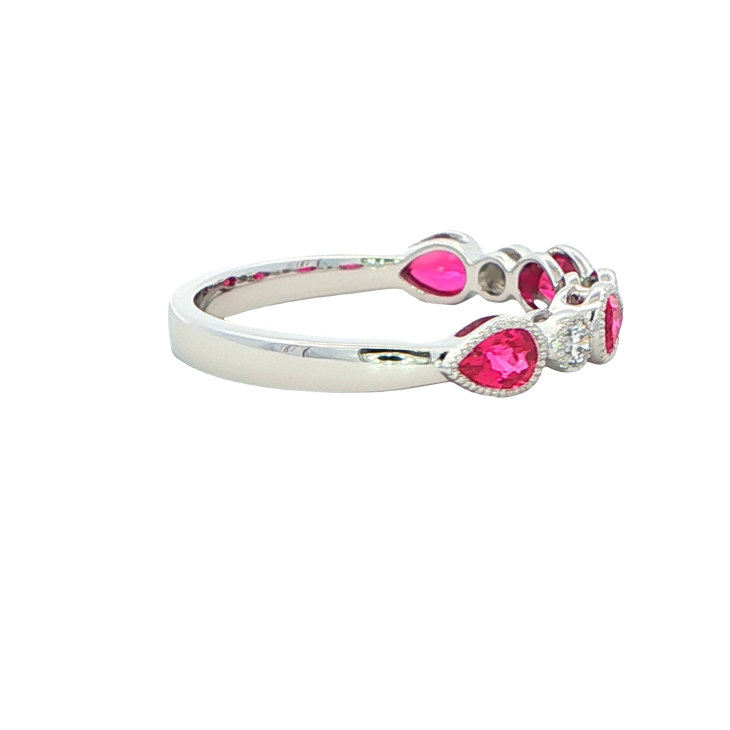 Pear Shaped Ruby and round brilliant cut diamond ring