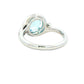 Aquamarine and round brilliant cut diamond halo cluster ring