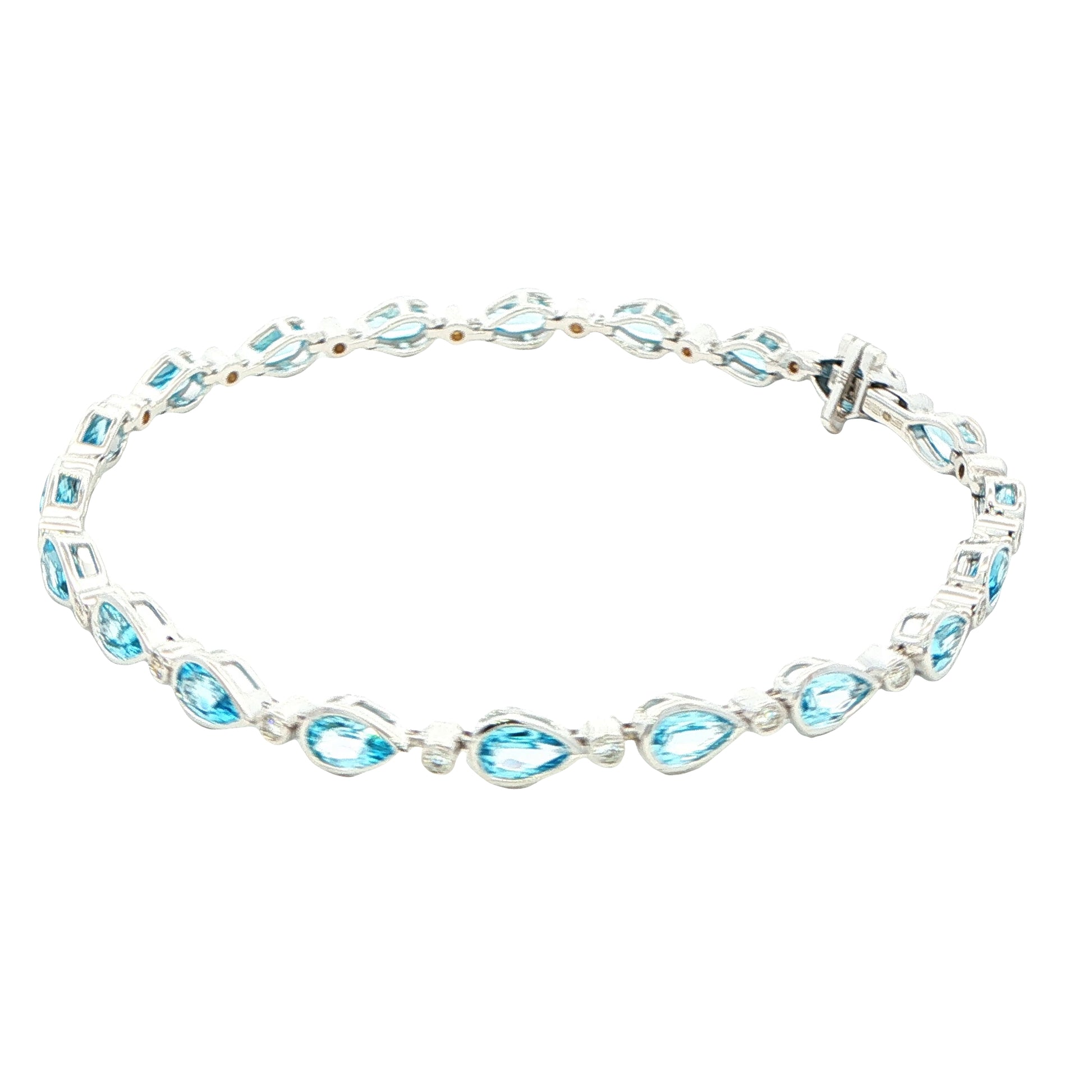 Pear Shaped Topaz and round brilliant cut diamond bracelet Gardiner Brothers