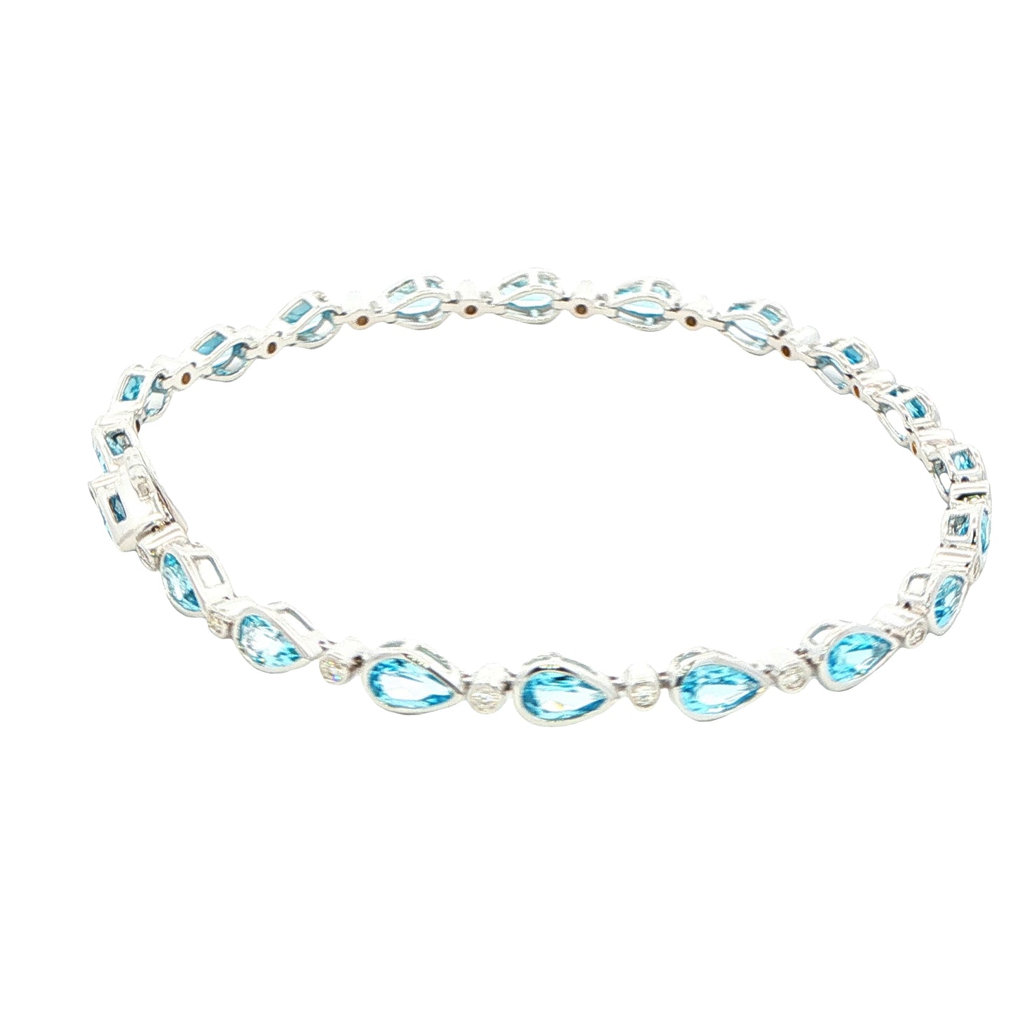 Pear Shaped Topaz and round brilliant cut diamond bracelet Gardiner Brothers