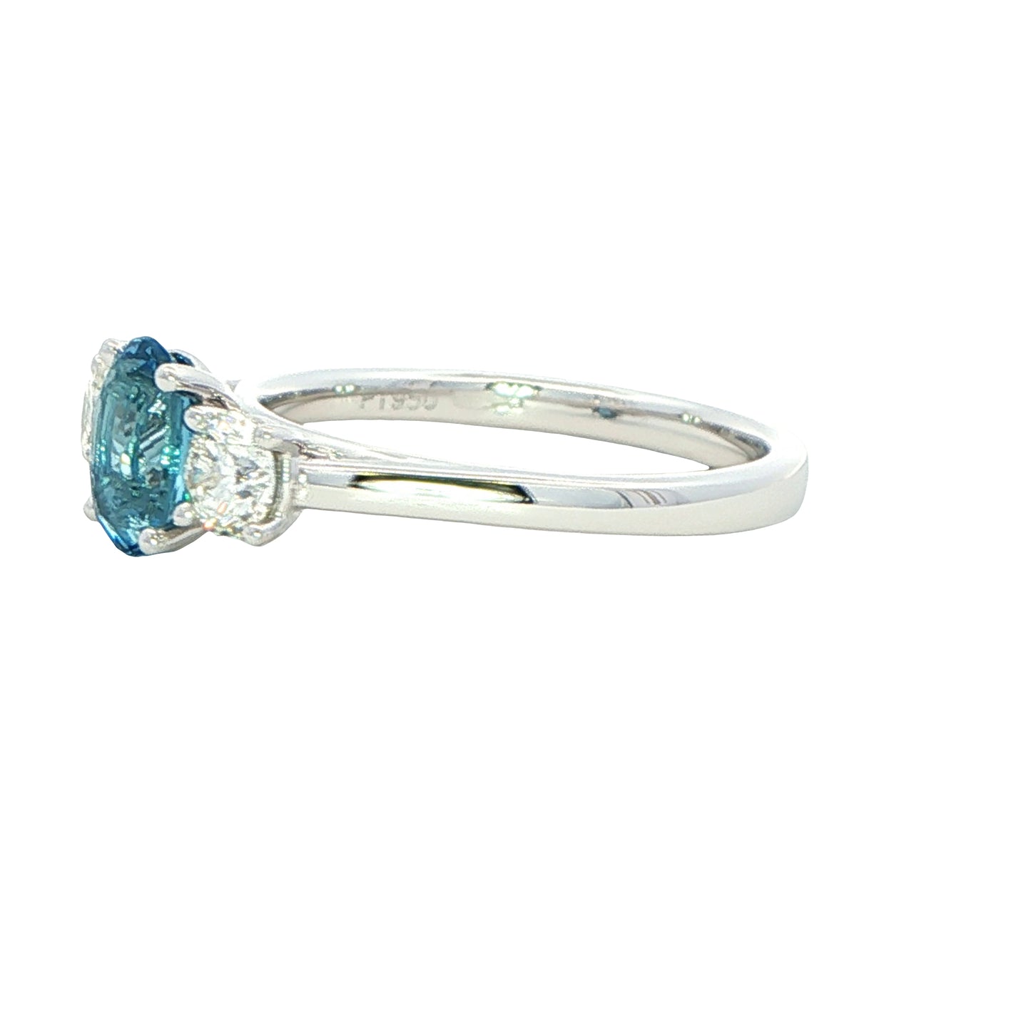 Oval shaped Aquamarine and round brilliant cut diamond 3 stone ring
