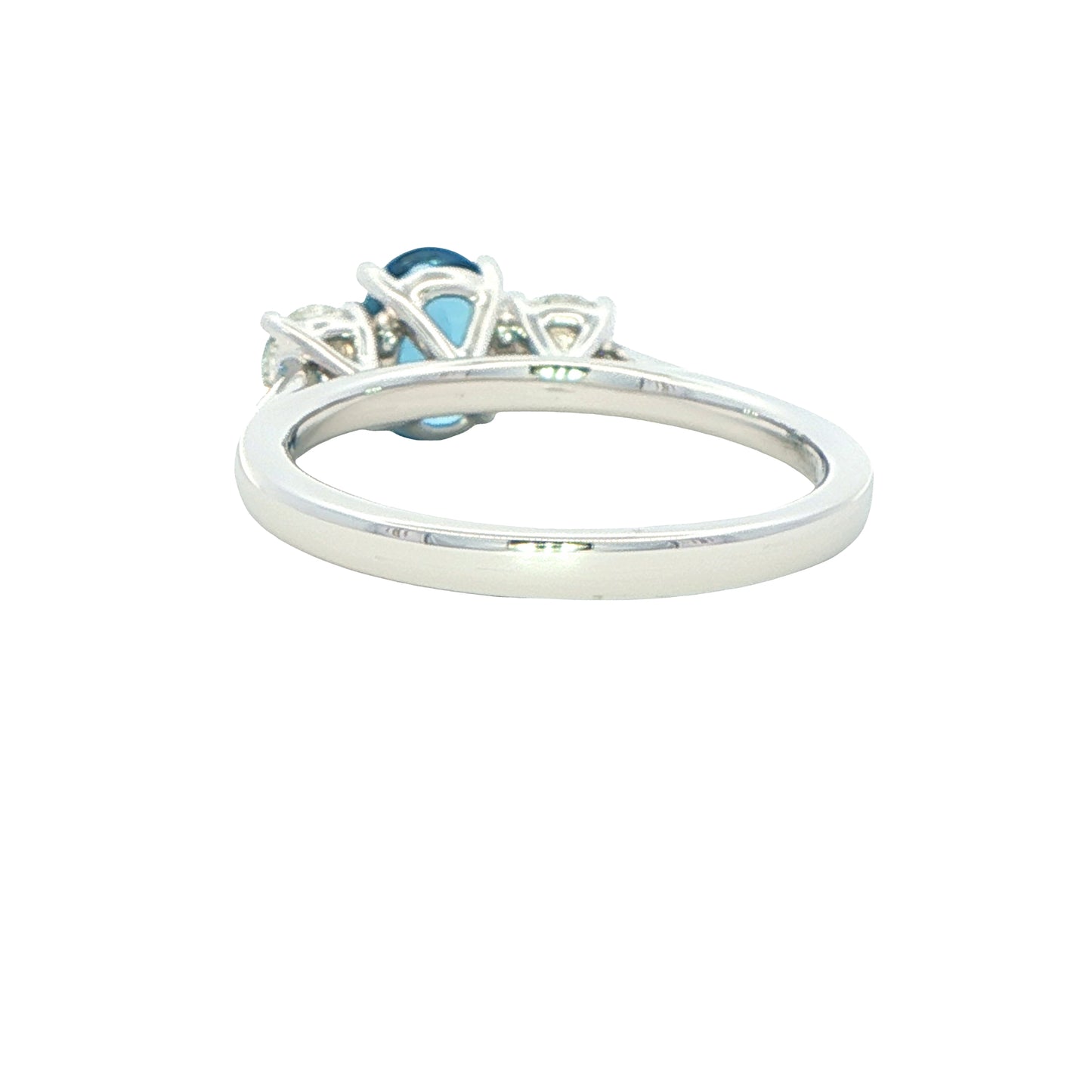 Oval shaped Aquamarine and round brilliant cut diamond 3 stone ring