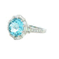 Aquamarine with baguette and round brilliant cut diamonds halo cluster ring Gardiner Brothers
