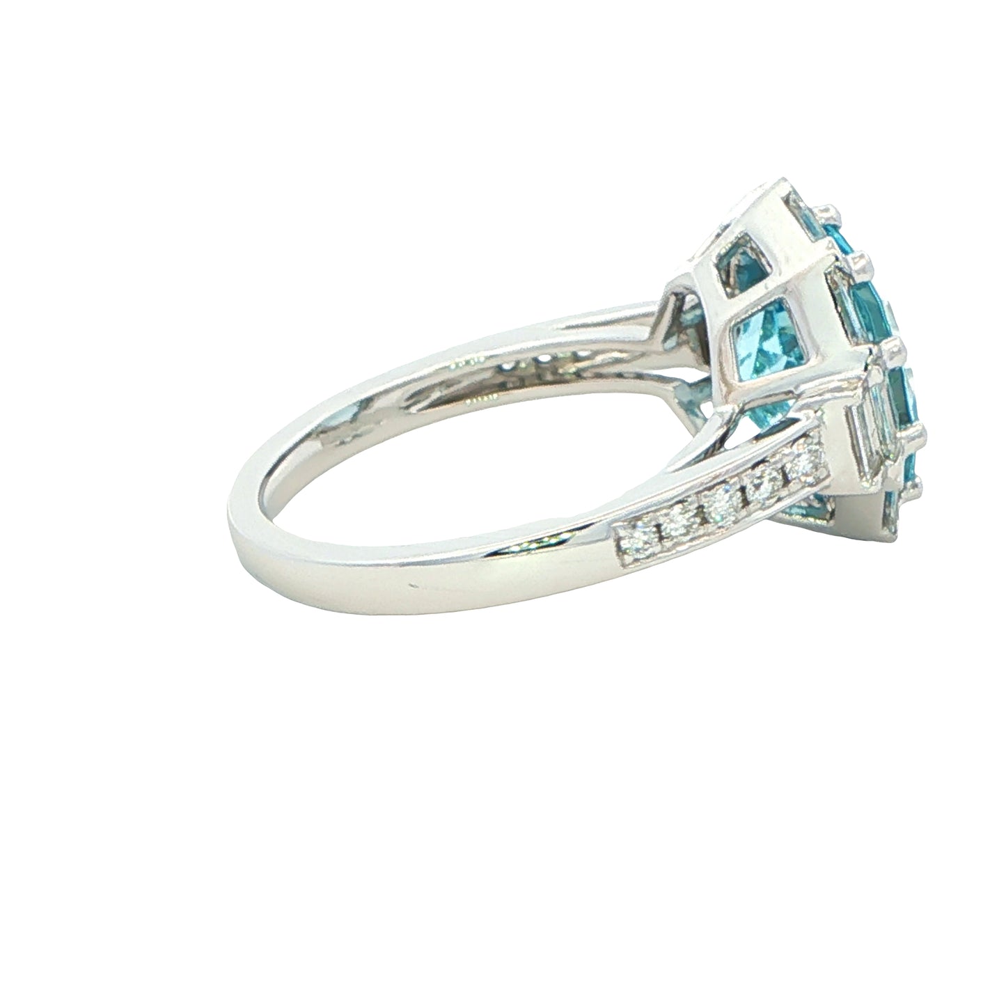 Aquamarine with baguette and round brilliant cut diamonds halo cluster ring Gardiner Brothers