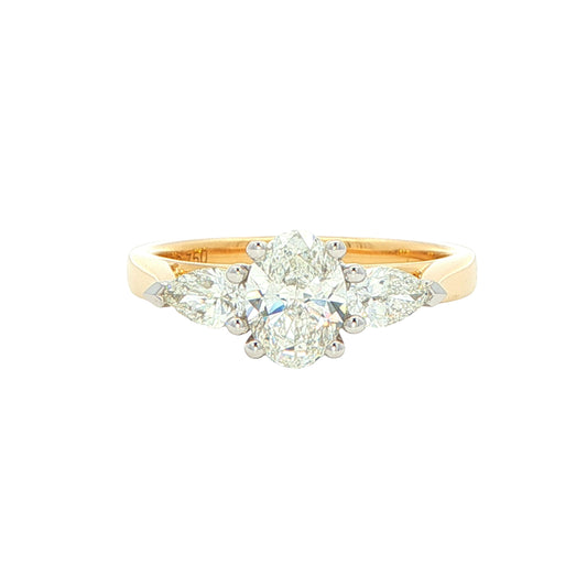 Oval and pear shaped diamond 3 stone ring - 1.09cts