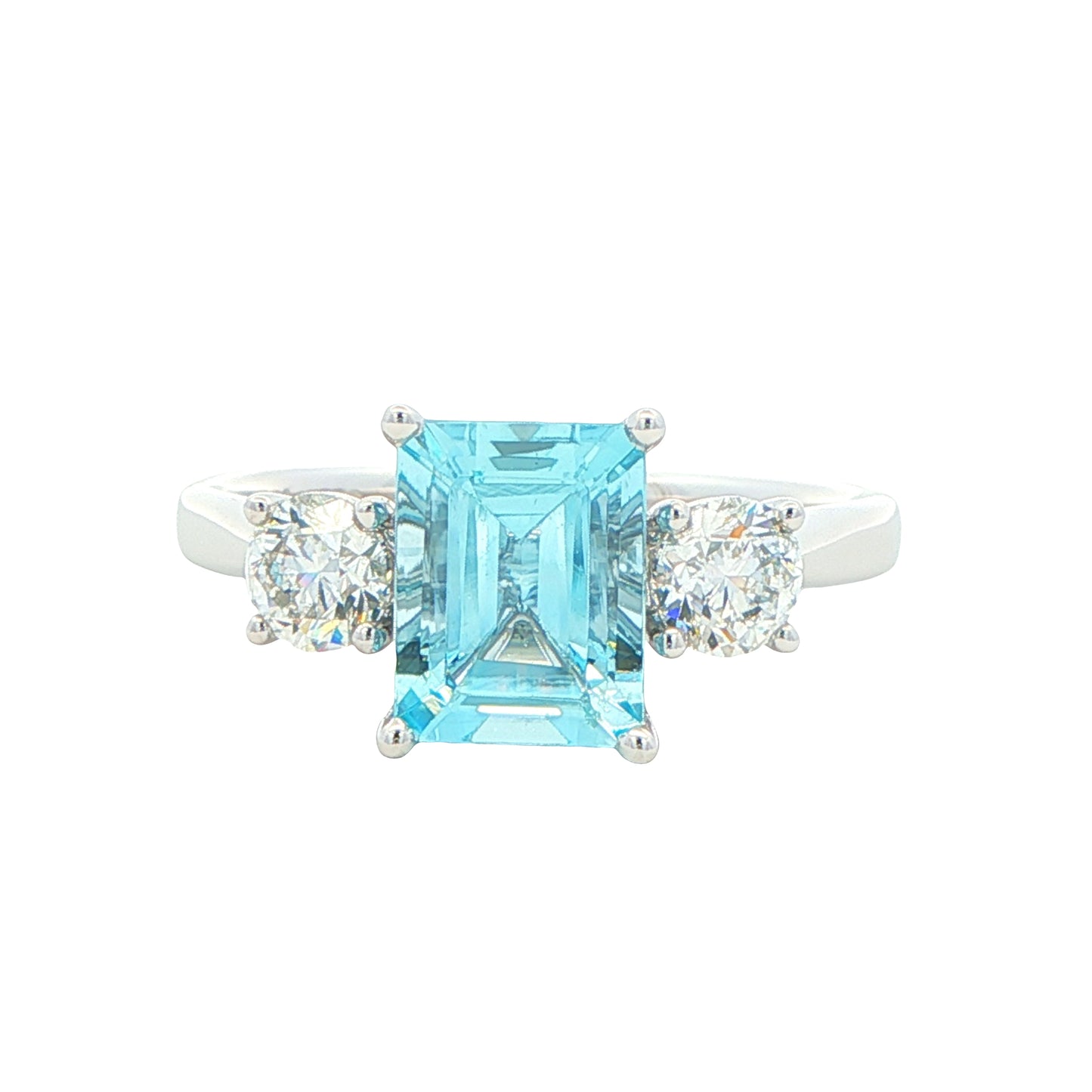 Octagonal shaped aquamarine and round brilliant cut diamond 3 stone ring Gardiner Brothers