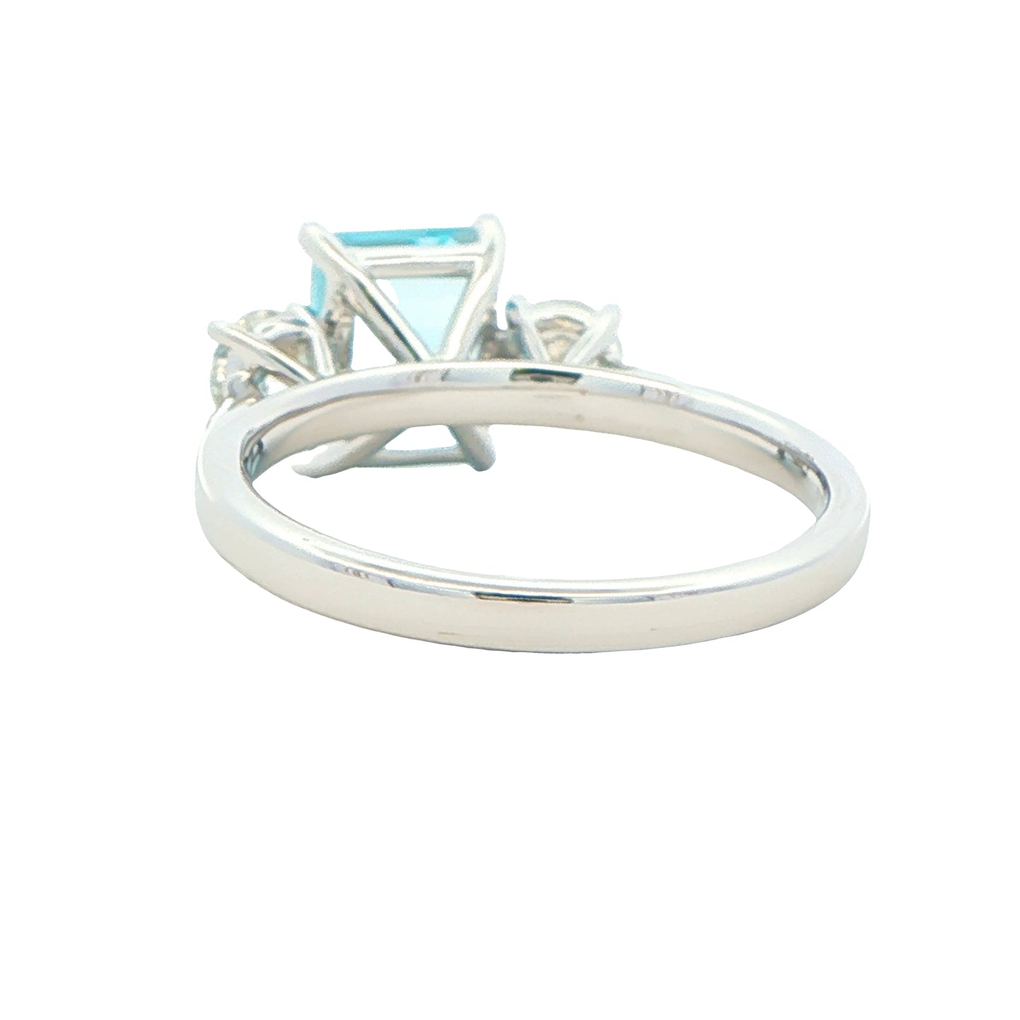 Octagonal shaped aquamarine and round brilliant cut diamond 3 stone ring Gardiner Brothers