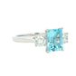 Octagonal shaped aquamarine and round brilliant cut diamond 3 stone ring Gardiner Brothers