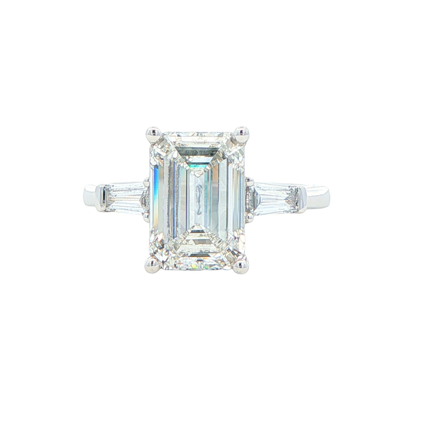 Emerald and Tapered Baguette cut diamond 3 stone ring