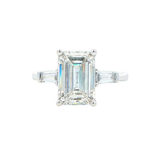 Emerald and Tapered Baguette cut diamond 3 stone ring Gardiner Brothers