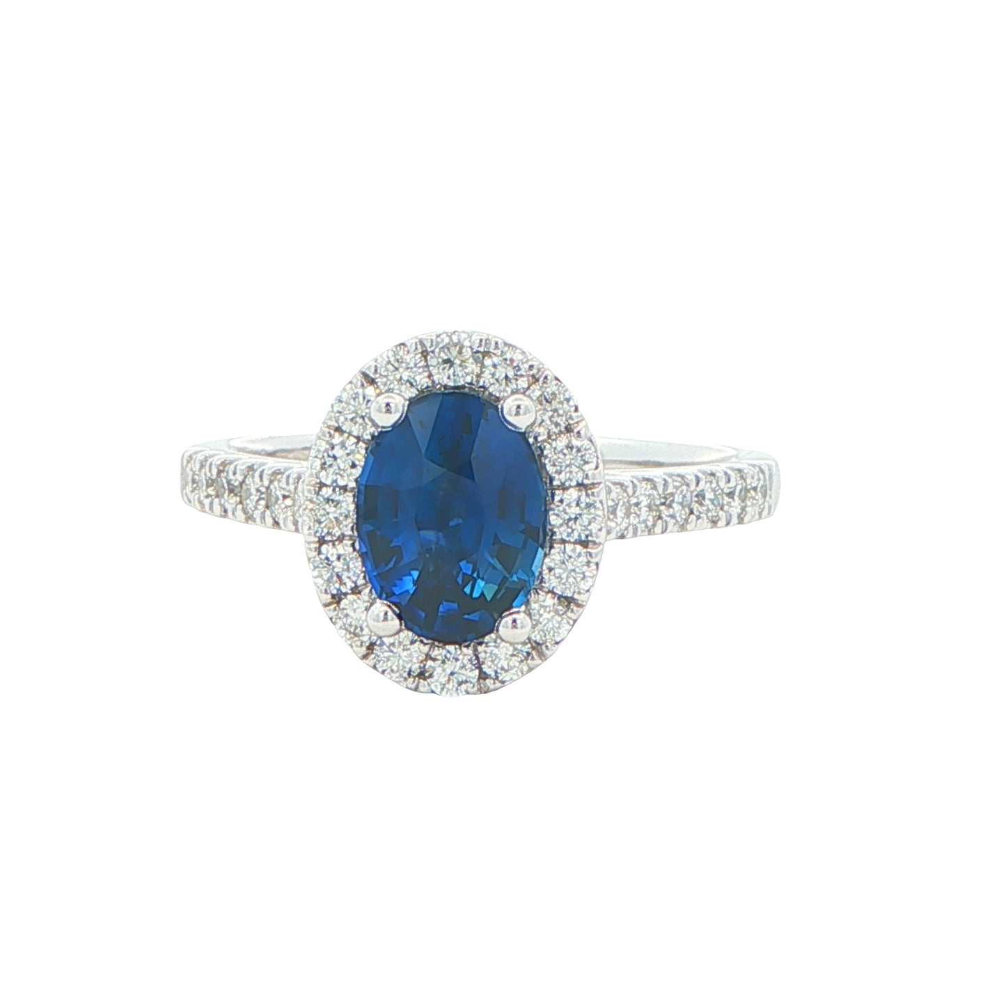 Oval Shaped Sapphire and Round Brilliant Cut Diamond Halo Ring Gardiner Brothers