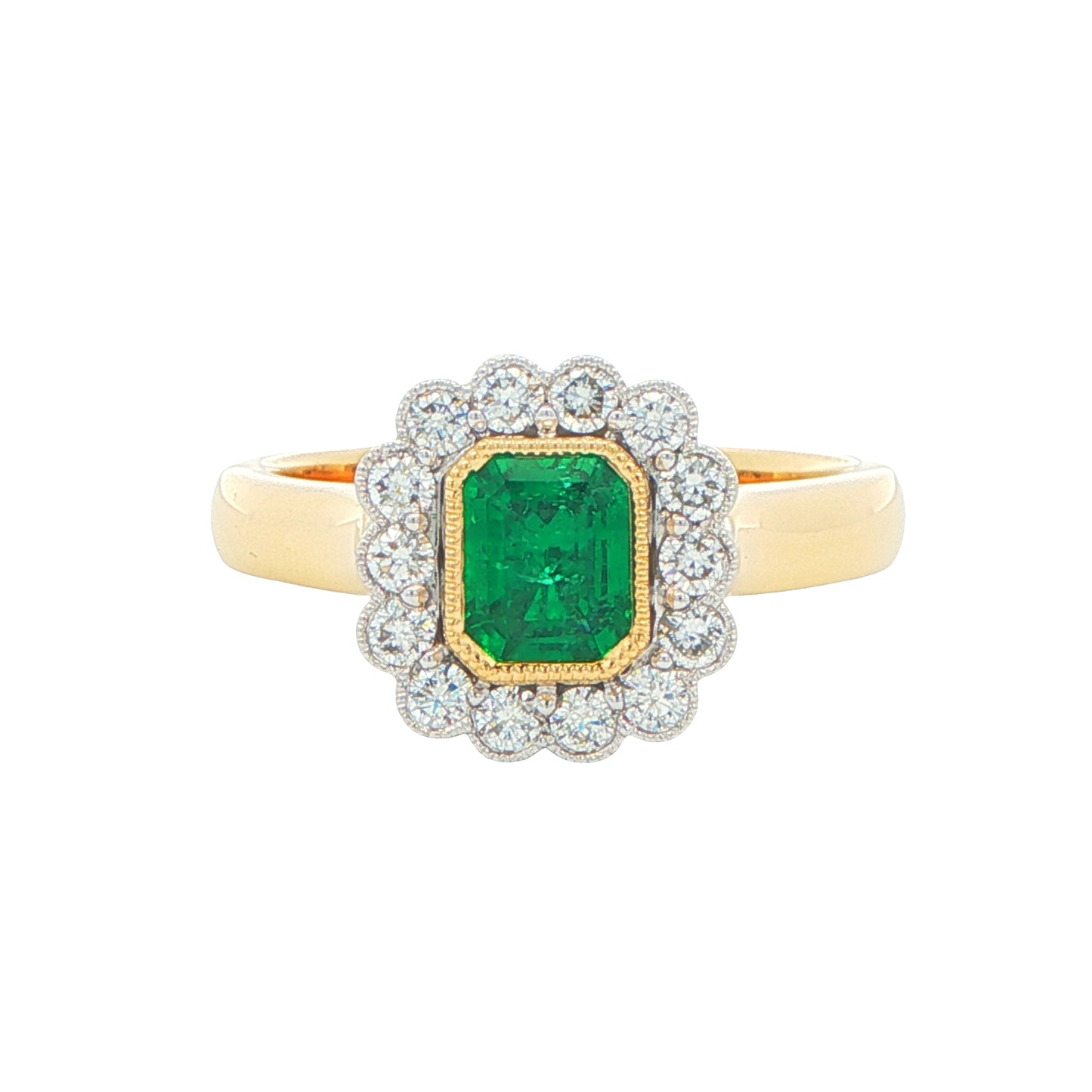 Octagonal Emerald and round brilliant cut diamond vintage cluster style ring Gardiner Brothers