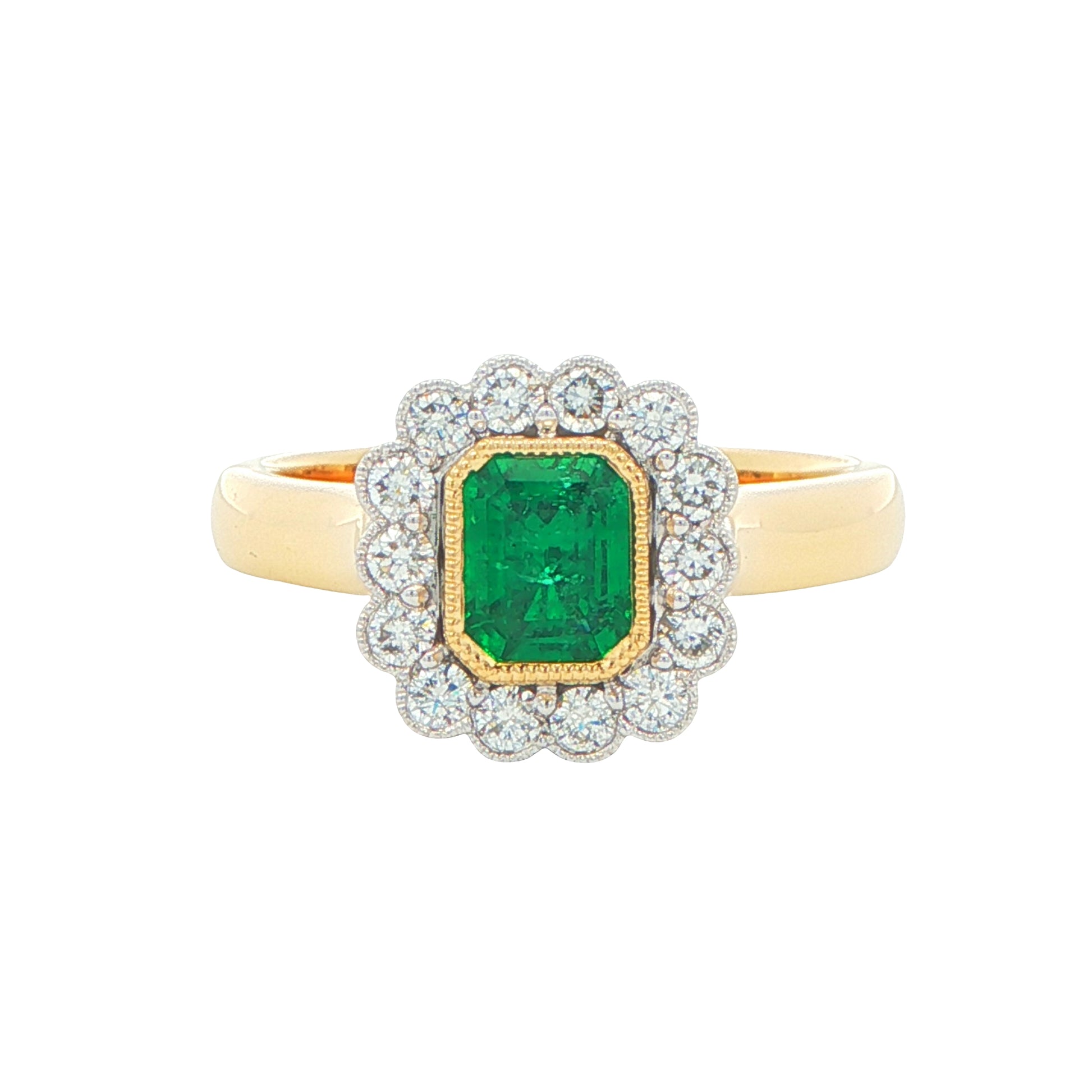 Octagonal Emerald and round brilliant cut diamond vintage cluster style ring Gardiner Brothers