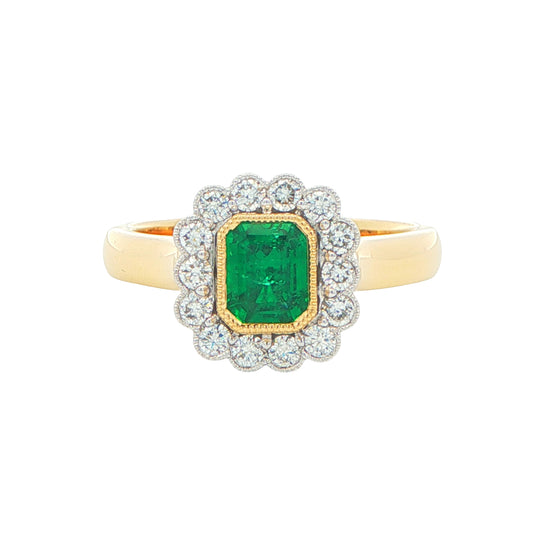 Octagonal Emerald and round brilliant cut diamond vintage cluster style ring Gardiner Brothers