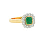 Octagonal Emerald and round brilliant cut diamond vintage cluster style ring Gardiner Brothers