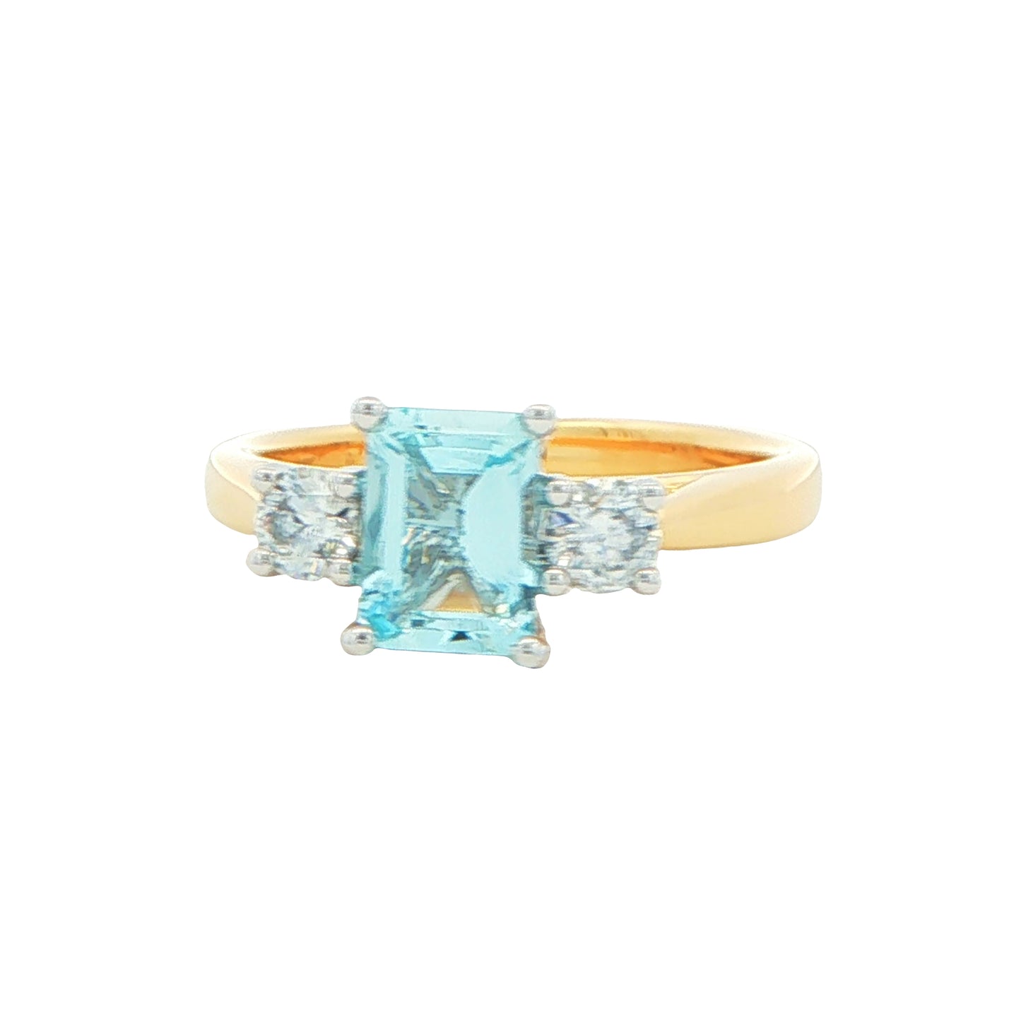 Octagonal Aquamarine and round brilliant cut diamond 3 stone ring