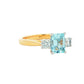 Octagonal Aquamarine and round brilliant cut diamond 3 stone ring