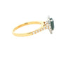 Pear Shaped Teal Sapphire and Round Brilliant Cut Diamond Halo Style Ring Gardiner Brothers