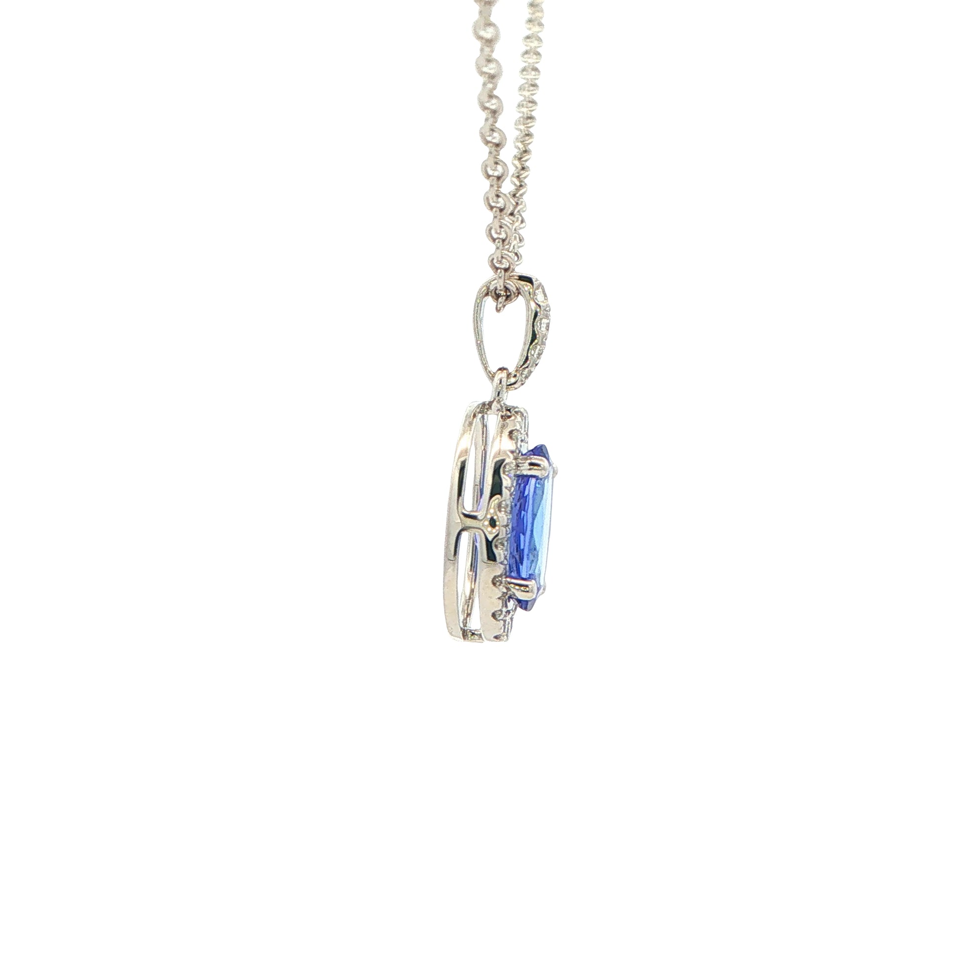 Tanzanite and diamond Halo Style Pendant Gardiner Brothers