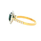 Cushion Shaped Teal Sapphire and Diamond Halo Style Ring Gardiner Brothers