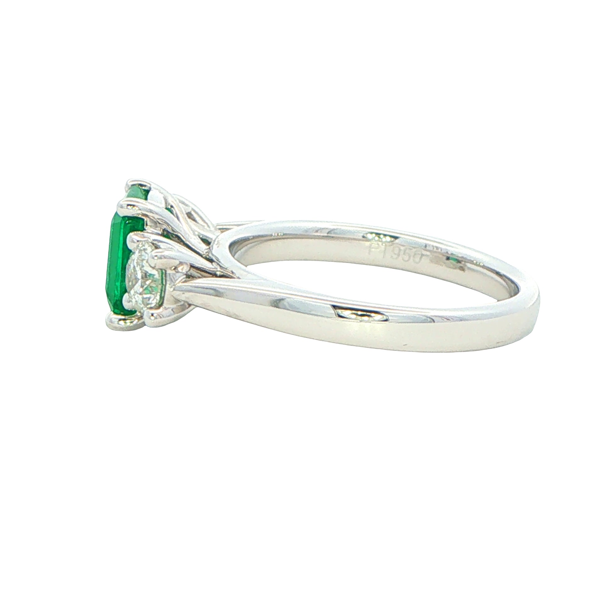 Octagonal shaped emerald and round brilliant cut diamond 3 stone ring Gardiner Brothers