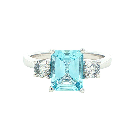 Octagonal Aquamarine and round brilliant cut diamond 3 stone ring Gardiner Brothers