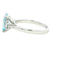 Octagonal Aquamarine and round brilliant cut diamond 3 stone ring Gardiner Brothers