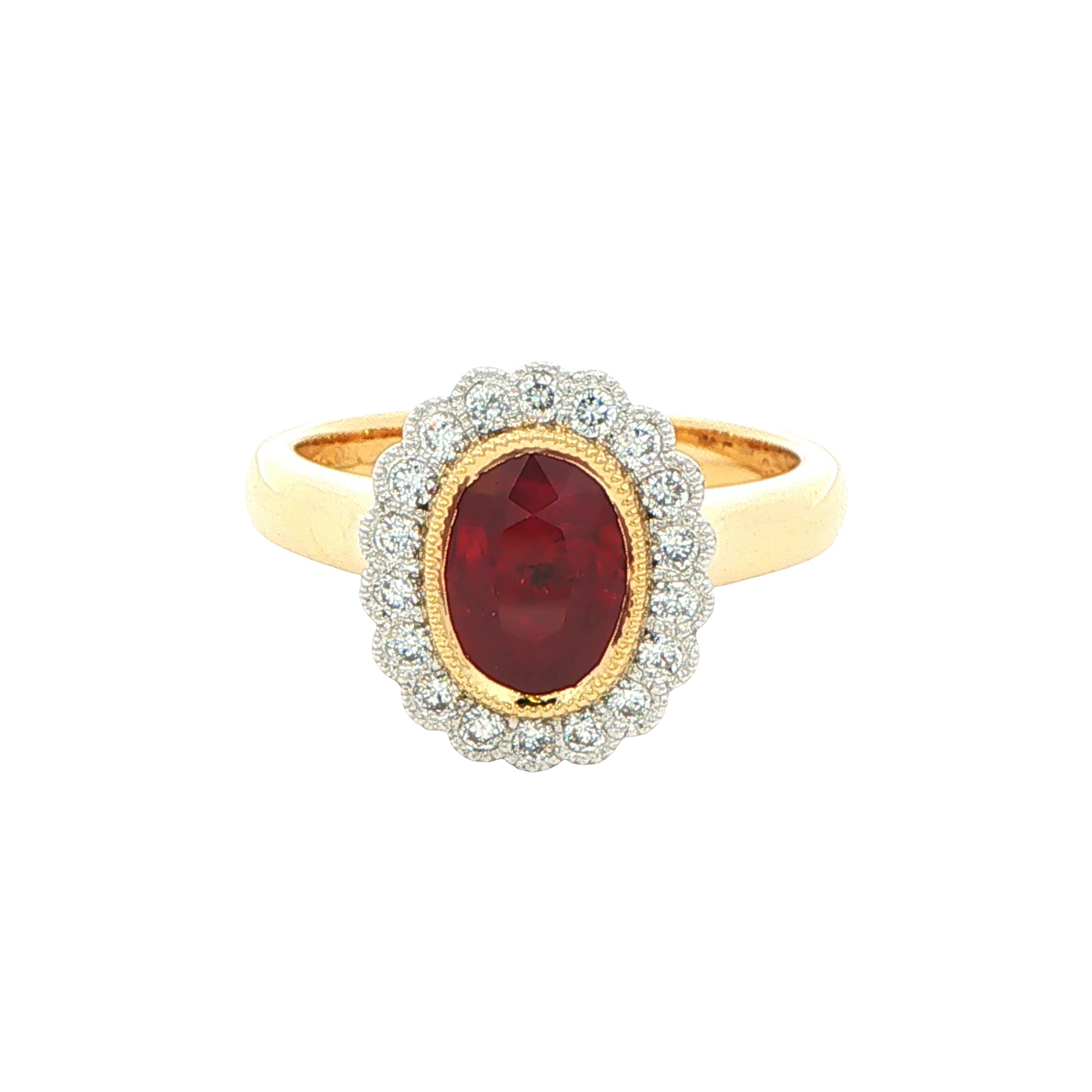 Oval ruby and round brilliant cut diamond vintage style cluster ring Gardiner Brothers