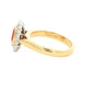 Oval ruby and round brilliant cut diamond vintage style cluster ring Gardiner Brothers