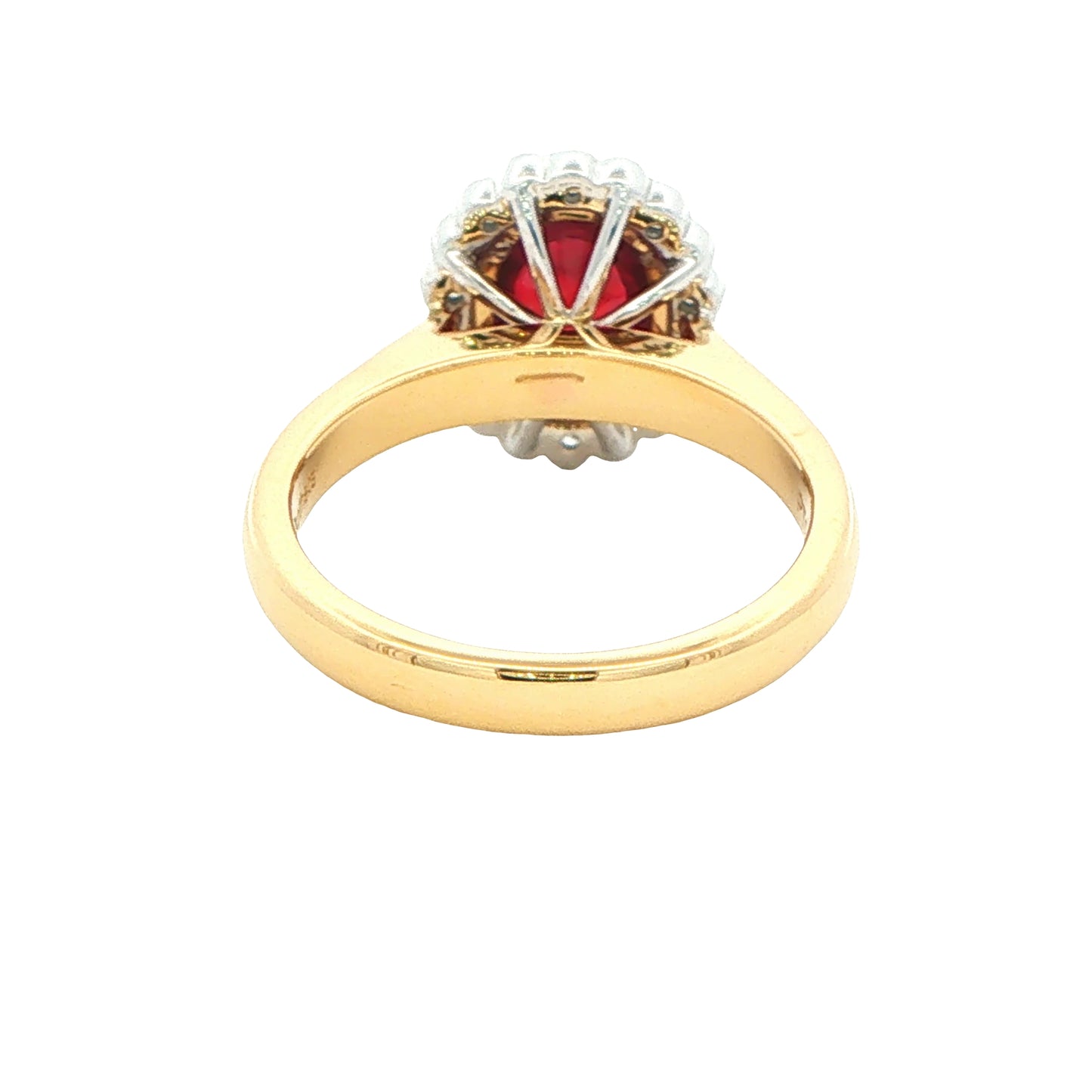 Oval ruby and round brilliant cut diamond vintage style cluster ring Gardiner Brothers