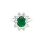 Octagonal shaped emerald and round brilliant cut diamond cluster style ring
